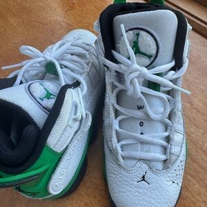 Jordan White and Green Mid-Top Sneakers with Iconic Design